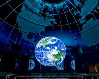 Earth Revealed sphere in exhibit gallery