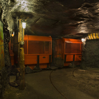 Train running underground through the Coal Mine exhibit.