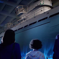 Museum guests viewing U-505 Submarine exhibit