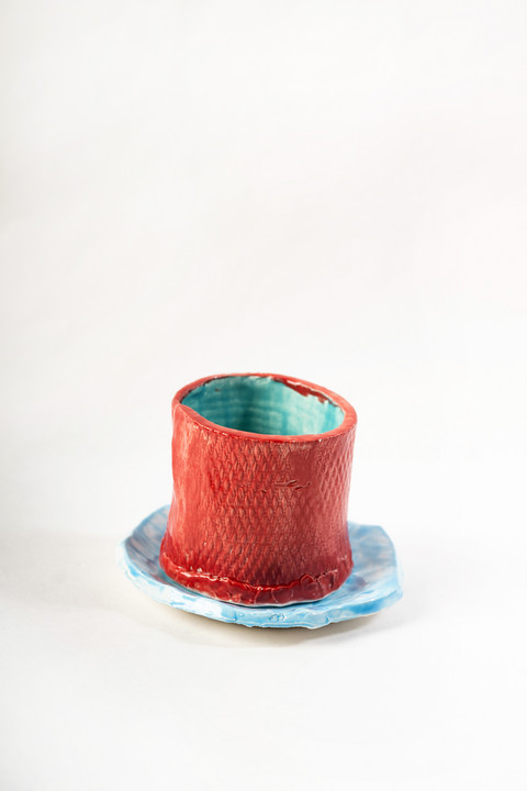 red mug and blue plate