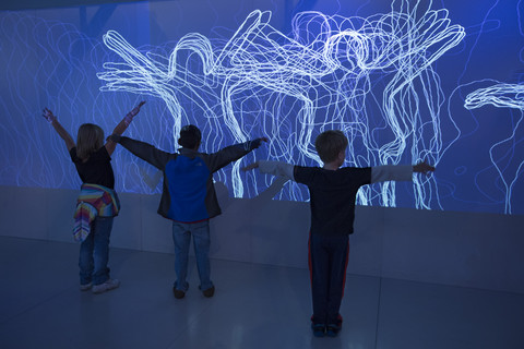 Young children dancing in Get in the Action exhibit